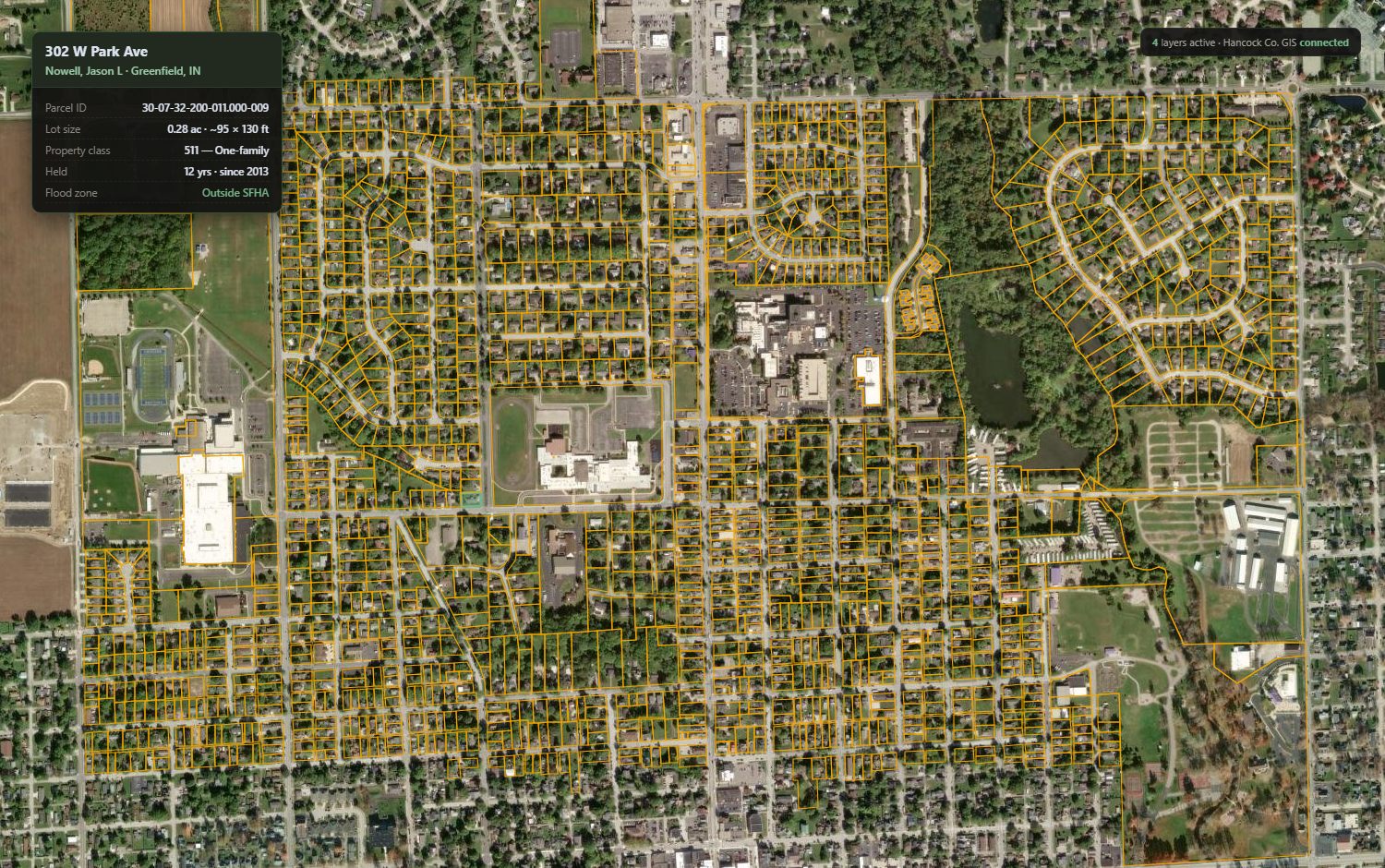 Mapnova map view: satellite imagery of Greenfield, Indiana with parcel boundaries and an owner record card